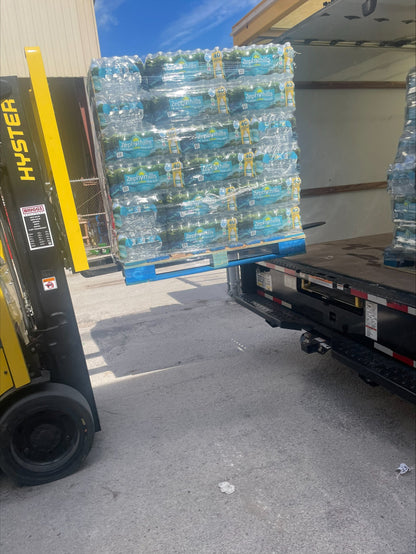 Full pallet of Zephyrhills Natural Spring Water featuring 1,920 bottles (48 cases) of 16.9 oz bottles stacked on a wooden shipping pallet.