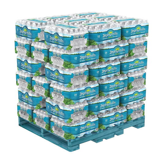 Close-up of Zephyrhills Natural Spring Water 16.9 oz bottles in branded packaging, emphasizing label details and clear plastic design.